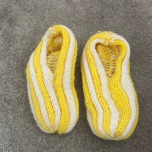 Yellow and white slippers